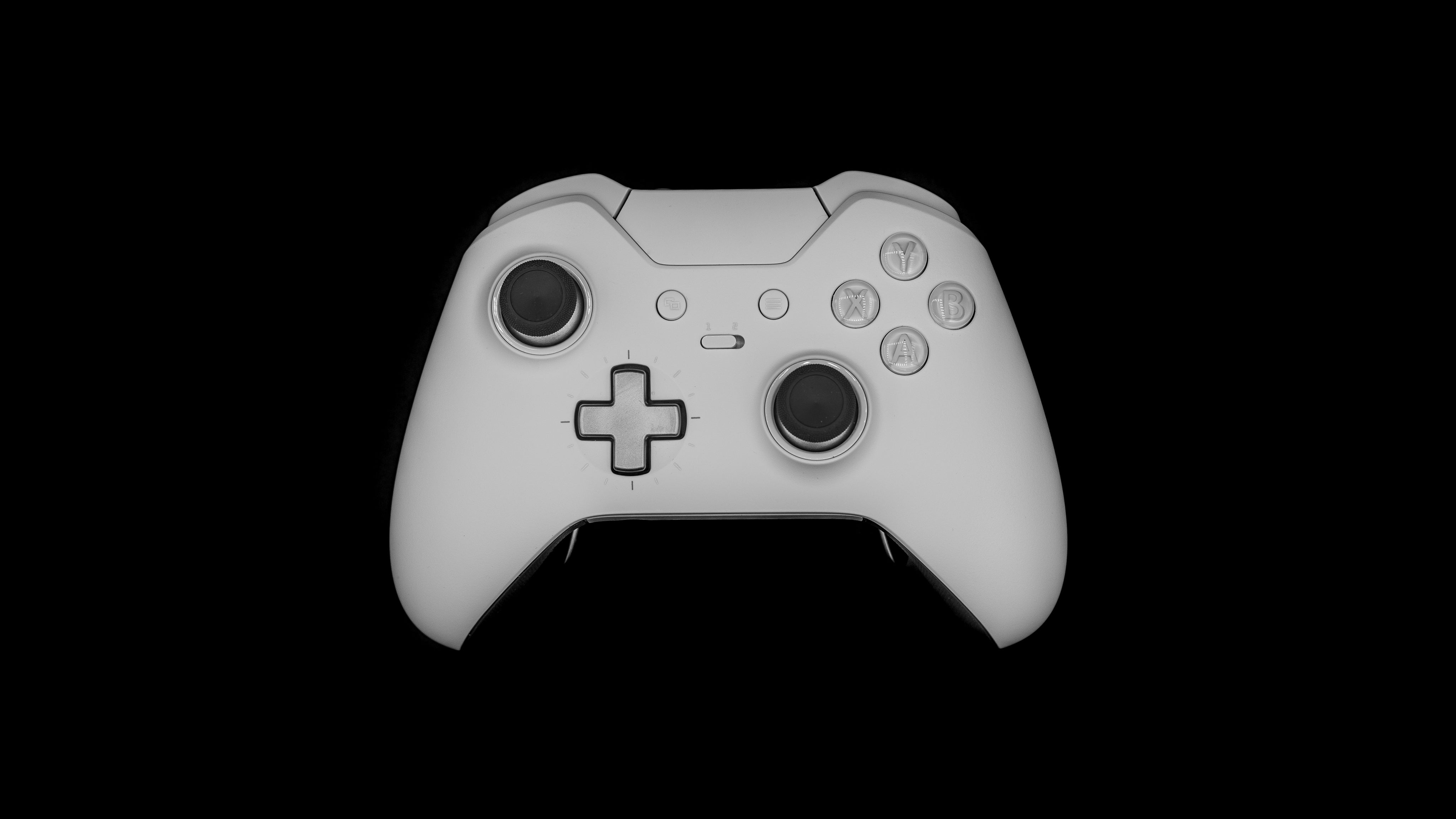 gaming-controller-against-a-black-background.jpg